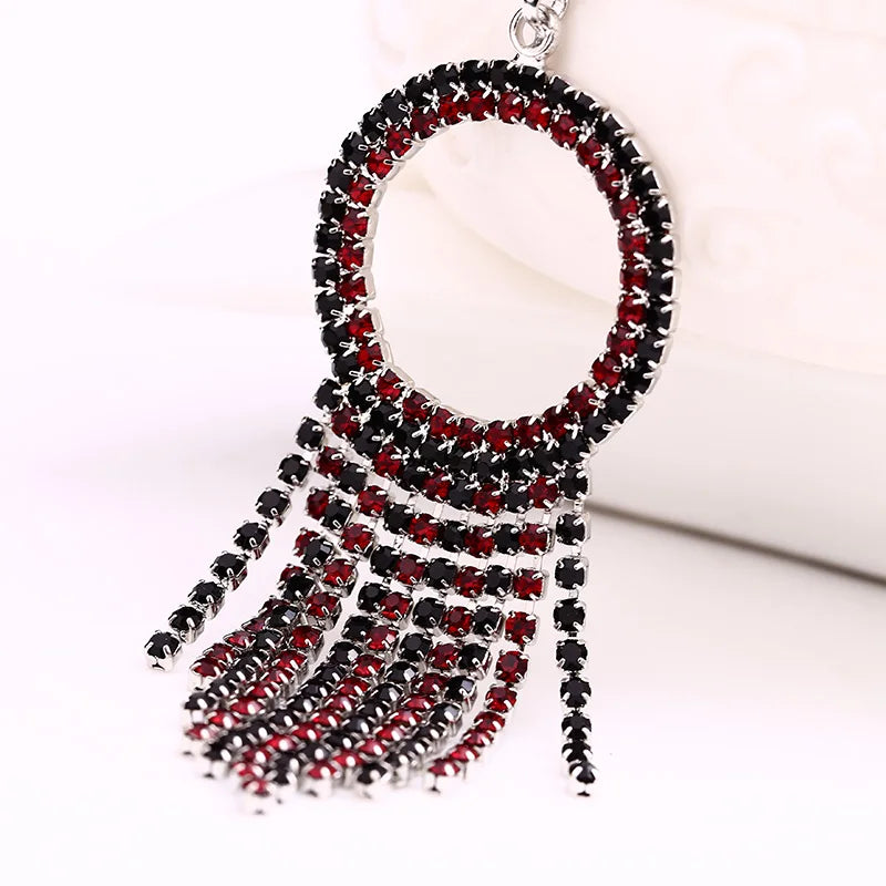 Radiant Crystal Cascade Tassel Drop Earrings – Glam Statement